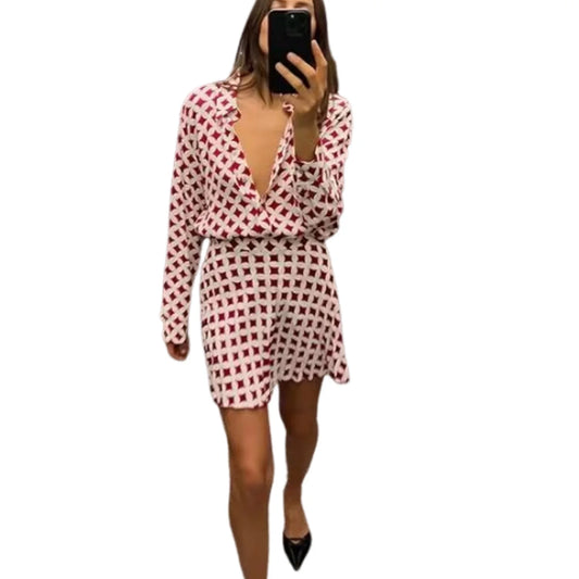 Women's new printed elastic shirt single breasted long sleeved top casual versatile mini skirt.