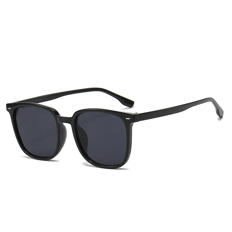 Stylish UV 400 Protective Brown Sunglasses with Black Frame for Men and Women - Classic Retro Fashion Eyewear.