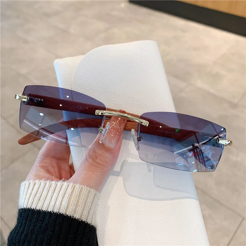 Trendy 2024 Unisex Rimless Rectangle Sunglasses for Driving and Travel with UV400 Protection.