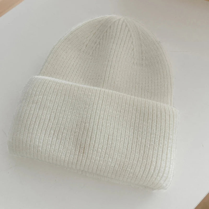 Cozy 2024 Angora Beanies for Women - Soft Knitted Rabbit Fur Winter Hat for Skiing and Cold Weather.