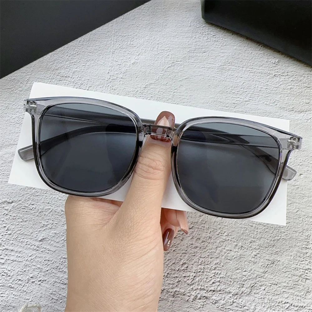 Stylish UV 400 Protective Brown Sunglasses with Black Frame for Men and Women - Classic Retro Fashion Eyewear