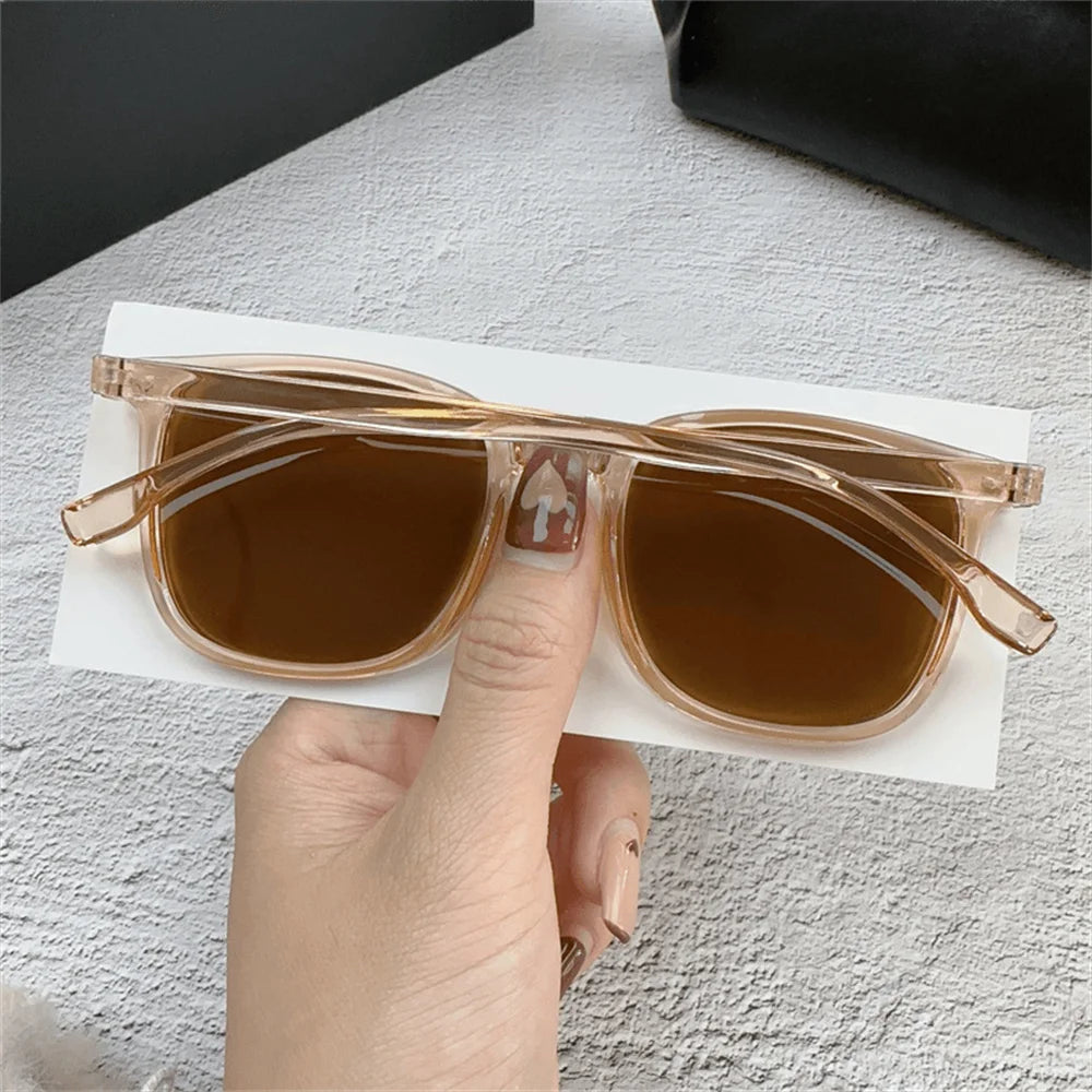 Stylish UV 400 Protective Brown Sunglasses with Black Frame for Men and Women - Classic Retro Fashion Eyewear