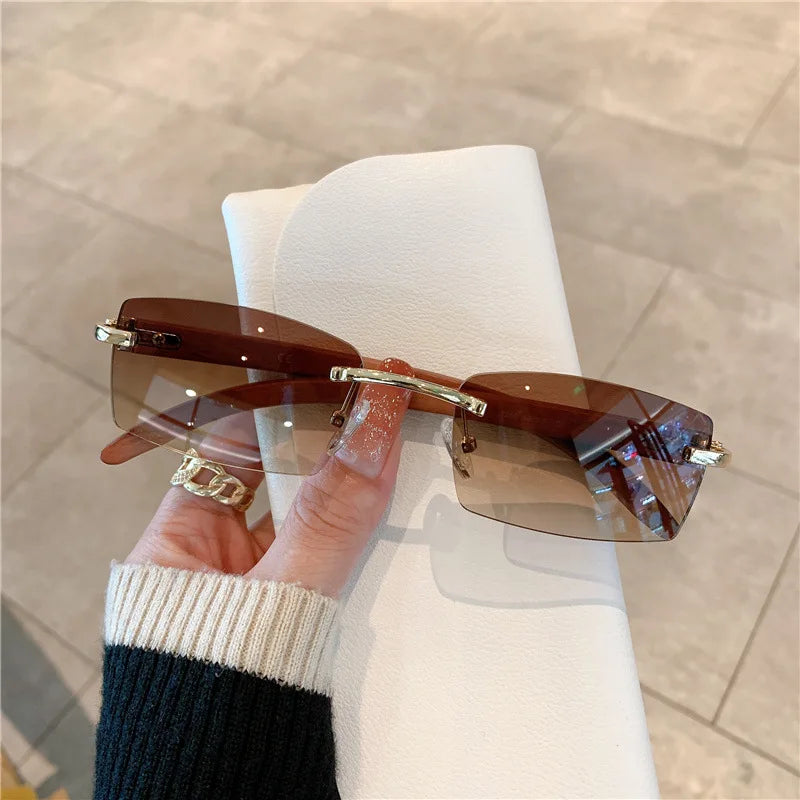 Trendy 2024 Unisex Rimless Rectangle Sunglasses for Driving and Travel with UV400 Protection.